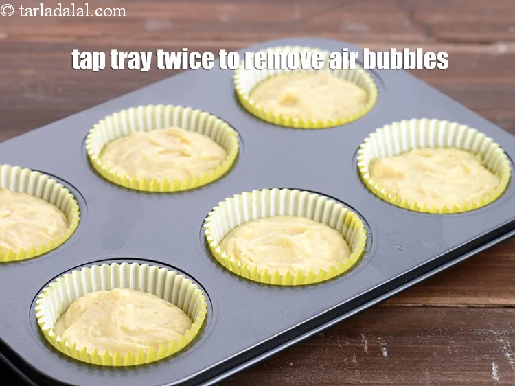 Step 18 – Tap the tray twice to remove the air bubbles.
