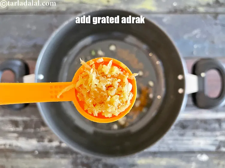 Step 30 – Add&nbsp;<meta charset="UTF-8" />1 tsp&nbsp;<a href="glossary-grated-ginger-943i">grated ginger (adrak)</a>.