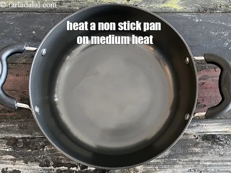Step 18 – <meta charset="UTF-8" />Heat a non-stick pan on a medium flame.
