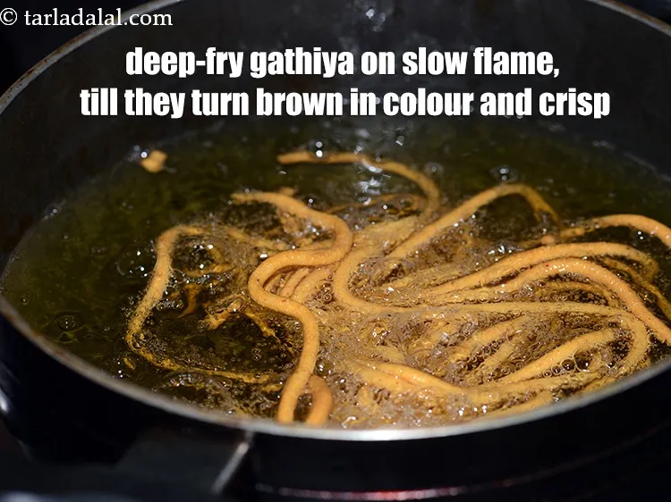 Step 18 – Deep-fry the gathiya on a slow flame, till they turn brown in colour and crisp …