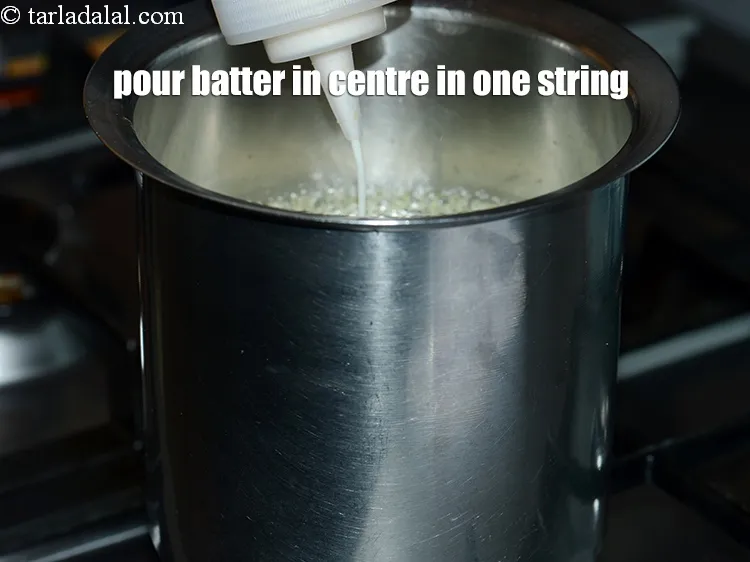 स्टेप 20 – गर्म होने पर बैटर को बीच में एक तार में …