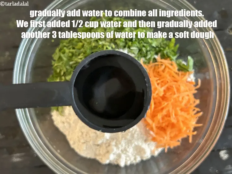 Step 19 – <meta charset="UTF-8" /> Gradually, add water to combine all the ingredients. We first&nbsp;added 1/2&nbsp;cup water …
