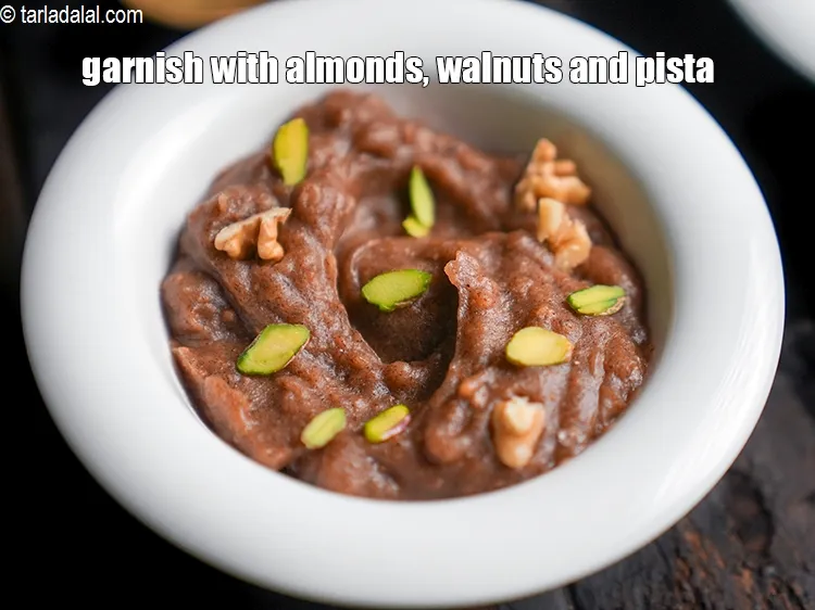Step 17 – Garnish with almonds, walnuts and pista.