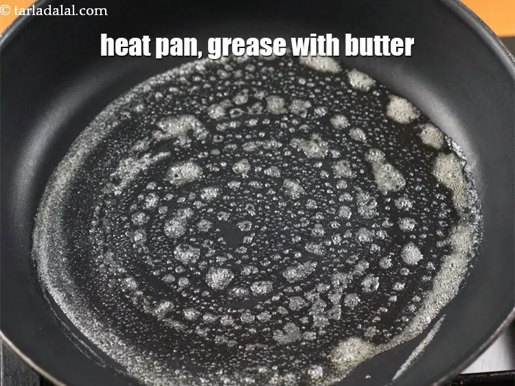 Step 18 – Heat a non-stick pan, grease with little butter.