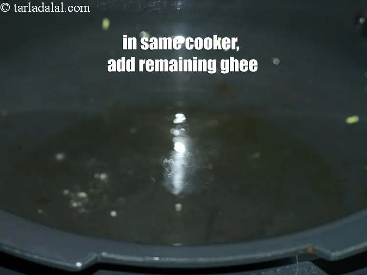 Step 19 – In the same pressure cooker, add 1 tsp of the remaining ghee.