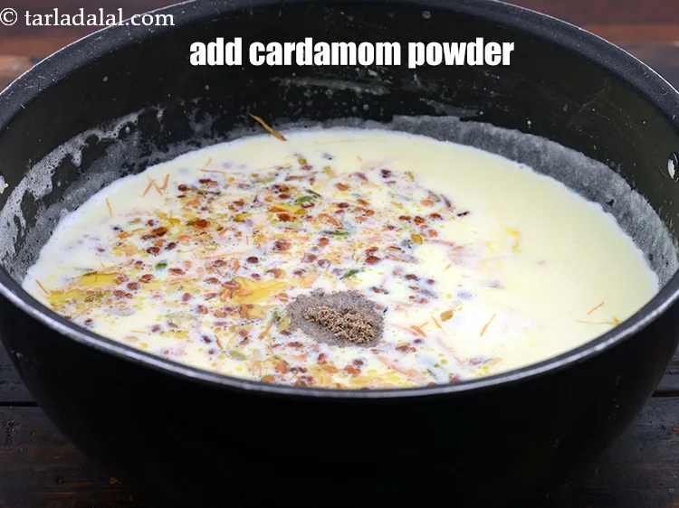 Step 18 – Add 1/4 tsp&nbsp;<a href="https://www.tarladalal.com/glossary-cardamom-powder-elaichi-powder-265i">cardamom (elaichi) powder</a>.