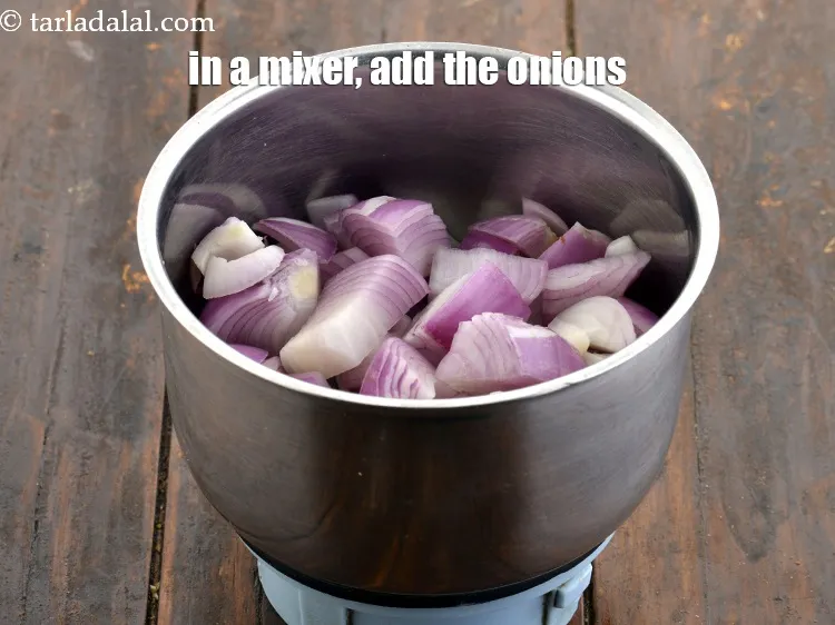 Step 16 – In a mixer, add the onions.