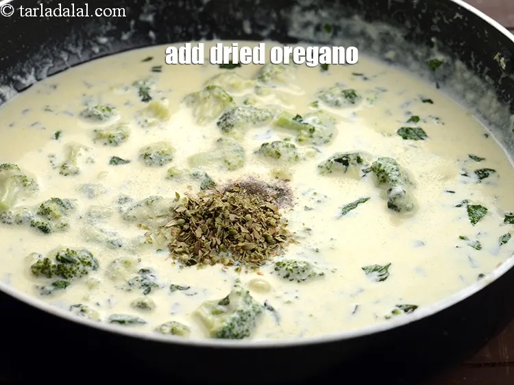 Step 18 – Add 1 tsp <a href="https://www.tarladalal.com/glossary-dried-oregano-268i">dried oregano</a>.