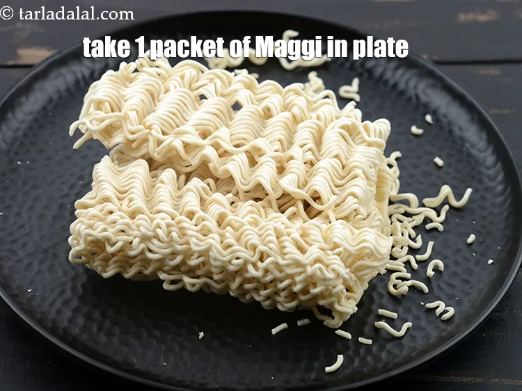 Step 19 – Take 1 packet of maggi in a plate.