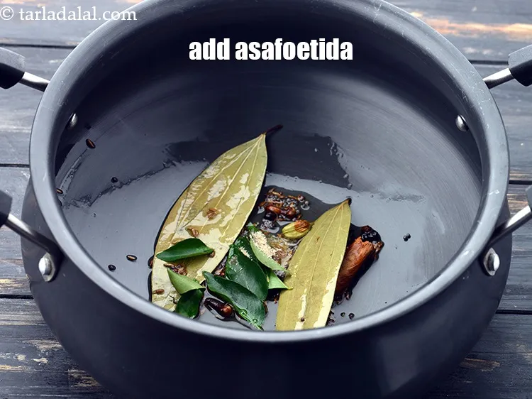 Step 19 – Add a pinch of&nbsp;<a href="https://www.tarladalal.com/glossary-asafoetida-hing-113i">asafoetida (hing)</a>.&nbsp;