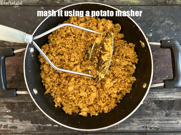 Step 28 – Mash&nbsp;it using a potato masher.