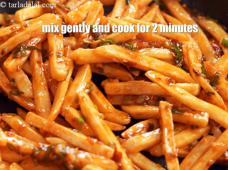 Step 18 – Mix gently and cook on a medium flame for 2 minutes.