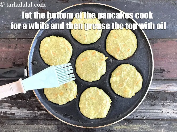 Step 25 – <meta charset="UTF-8" />Let the bottom of the pancakes cook for a while. Then grease the …