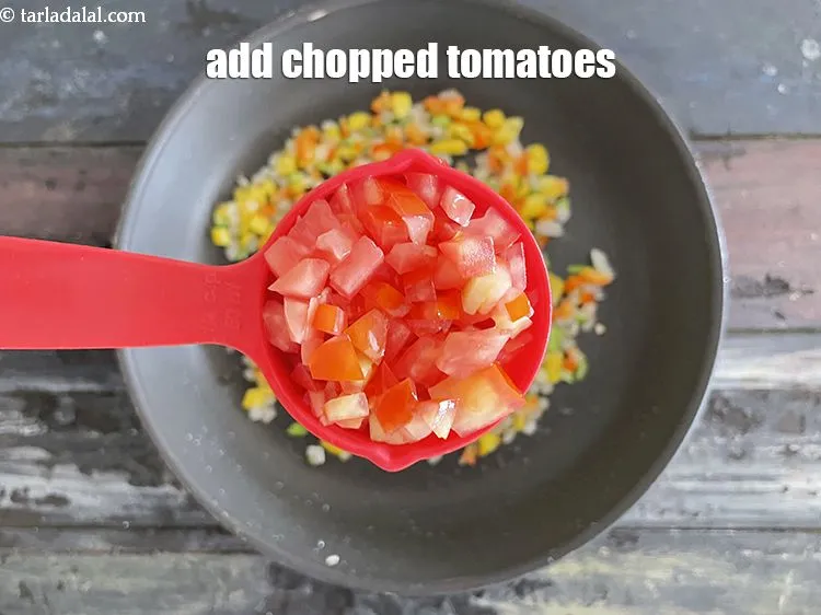 Step 19 – Add&nbsp;<meta charset="UTF-8" />1/4 cup&nbsp;<a href="glossary-chopped-tomatoes-779i">chopped tomatoes</a>.