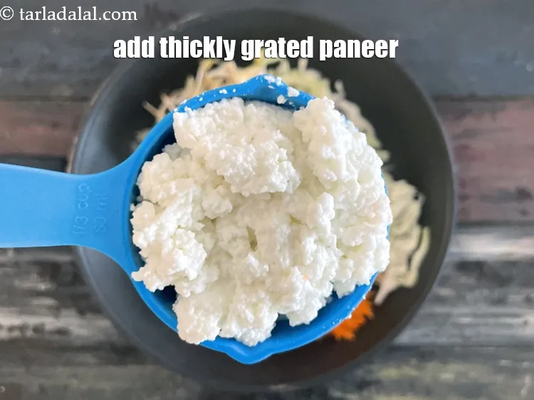 Step 20 – Add&nbsp;<meta charset="UTF-8" />1/3 cup&nbsp;thickly&nbsp;<a href="glossary-grated-low-fat-paneer-1118i">grated low-fat paneer</a>.