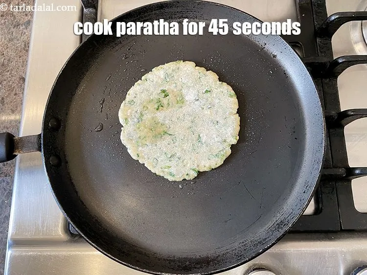Step 20 – Cook paratha for 45 seconds on a medium flame.
