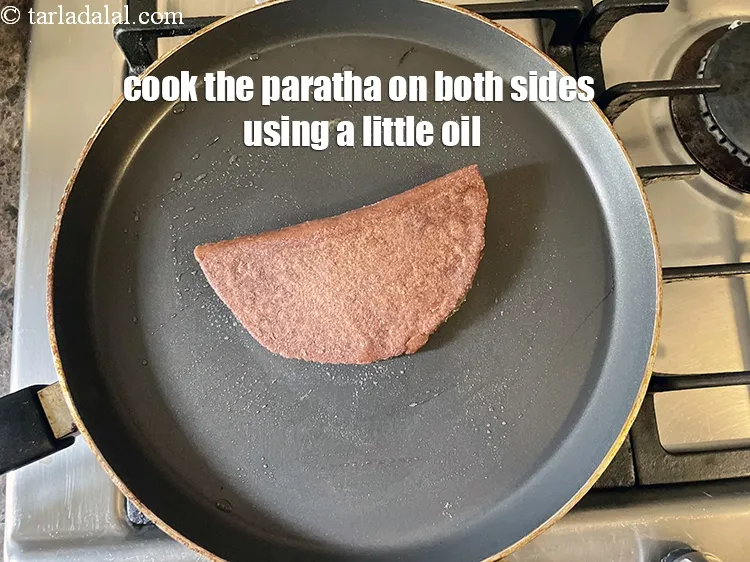 Step 23 – Cook the paratha, using a little oil on&nbsp;both the sides.