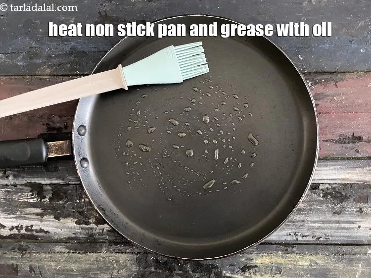 Step 18 – Heat a non stick pan and grease it with oil. You need to do that …