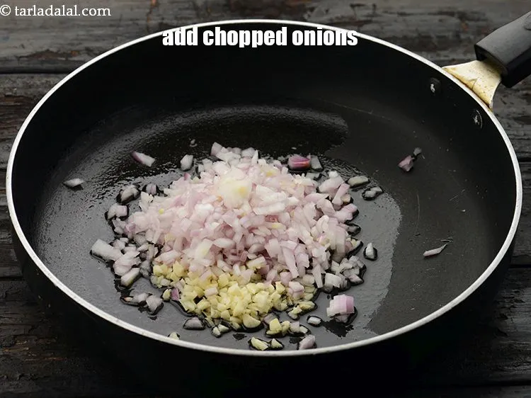 Step 18 – Add 1/2 cup&nbsp;finely&nbsp;<a href="https://www.tarladalal.com/glossary-chopped-onions-722i">chopped onions</a>.