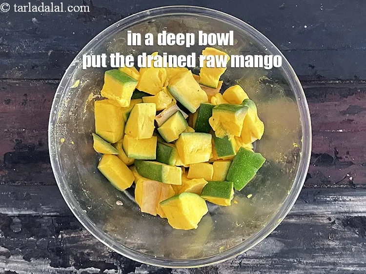 Step 26 – In a deep bowl put the drained raw mango.