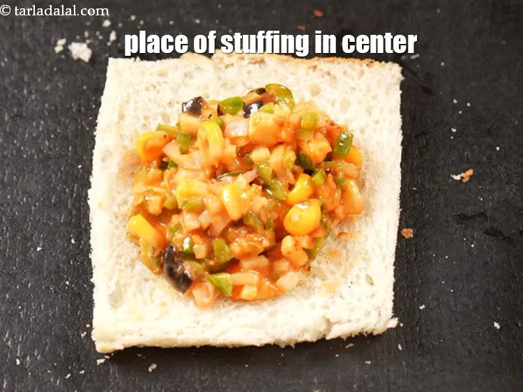 Step 18 – Place 1 tbsp of the stuffing in the center.