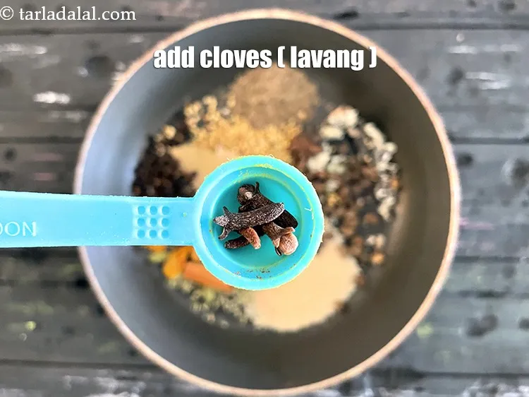 Step 18 – Add&nbsp;<meta charset="UTF-8" />5&nbsp;<a href="glossary-cloves-laung-lavang-322i">cloves (laung / lavang)</a>.
