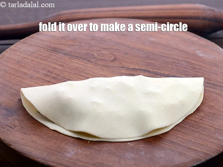 Step 19 – Fold it over to make a semi-circle.