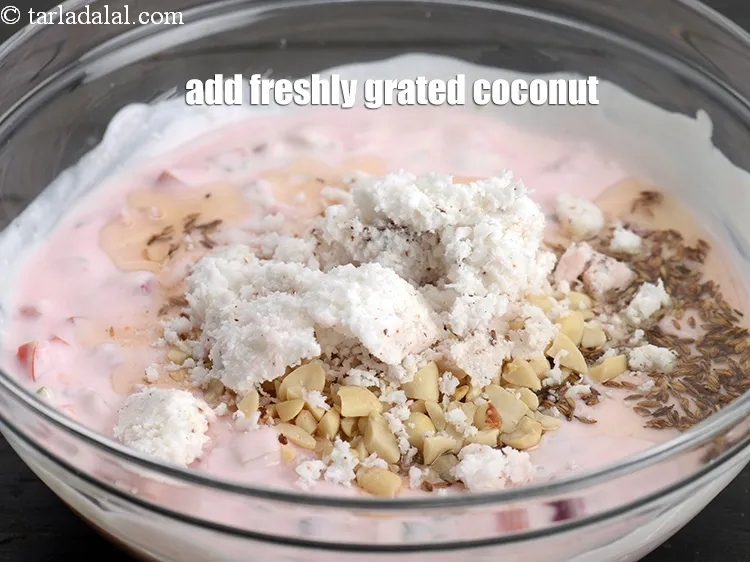 Step 18 – Add &frac14; cup freshly <a href="https://www.tarladalal.com/glossary-grated-coconut-852i">grated coconut</a>.