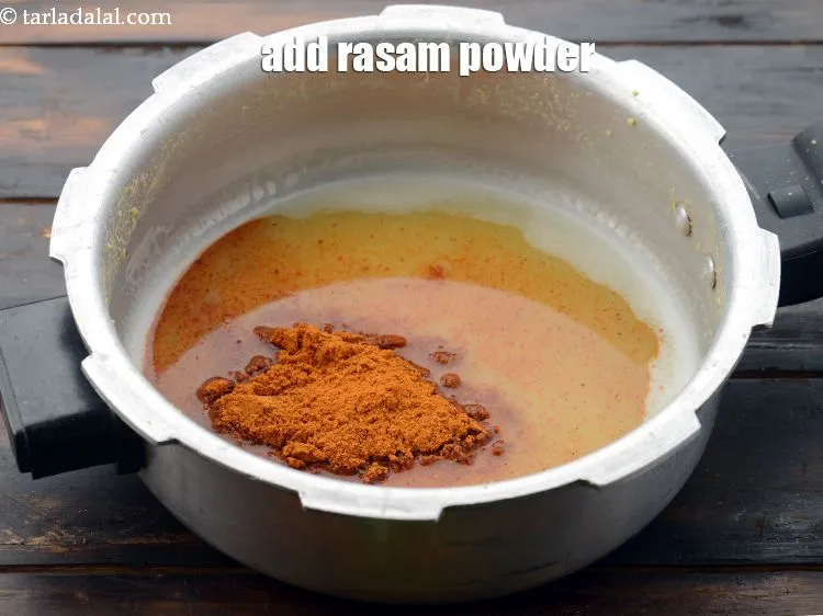 Step 23 – Add the rasam powder.<u><em> See above on step by step on how to make rasam …