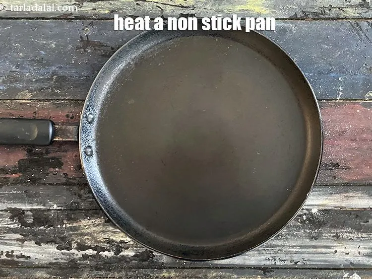 Step 21 – Heat a non stick tava.