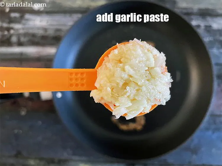 Step 18 – Add&nbsp;1 tsp&nbsp;<a href="glossary-garlic-paste-lehsun-ki-paste-lahsun-ki-paste-350i">garlic (lehsun) paste</a>.