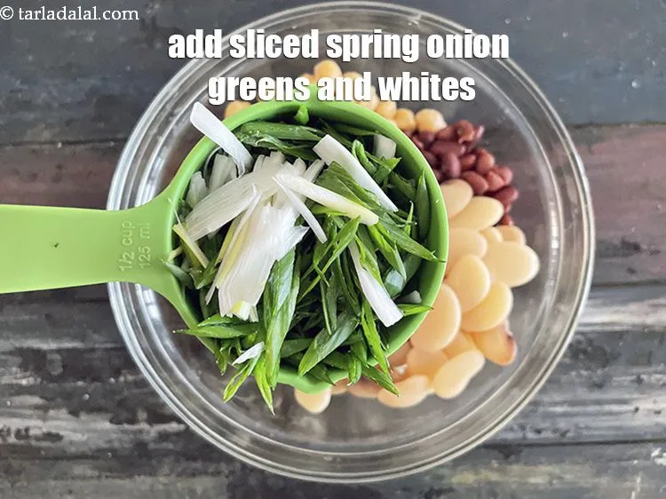 Step 41 – Add&nbsp;<meta charset="UTF-8" />1/2 cup&nbsp;<a href="glossary-sliced-spring-onions-1576i">sliced spring onions</a>&nbsp;whites and greens.