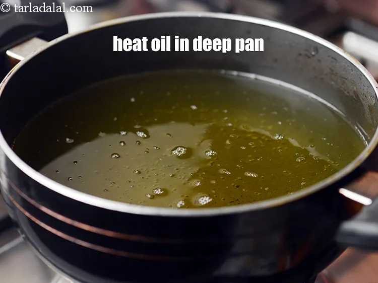 Step 19 – Heat the oil in a deep non-stick pan.