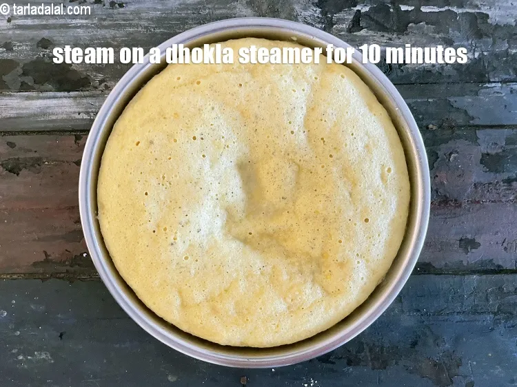 Step 18 – Steam in a dhokla steamer for about 10 minutes on a medium flame.