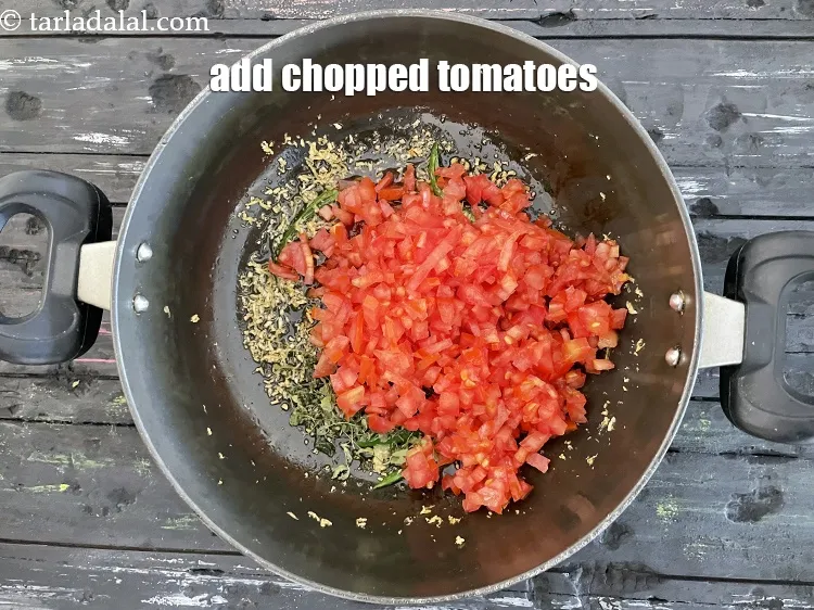 Step 18 – Add&nbsp;<meta charset="UTF-8" /><strong>1 1/2 cups finely</strong>&nbsp;<a href="glossary-chopped-tomatoes-779i">chopped tomatoes</a>.