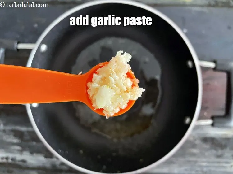 Step 18 – Add&nbsp;<meta charset="UTF-8" />1 1/2 tsp&nbsp;<a href="glossary-garlic-paste-lehsun-ki-paste-lahsun-ki-paste-350i">garlic (lehsun) paste</a>.