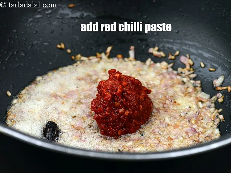 Step 19 – Add 2 tbsp <a href="https://www.tarladalal.com/glossary-red-chilli-paste-lal-mirch-ki-paste-340i">red chilli paste</a>.