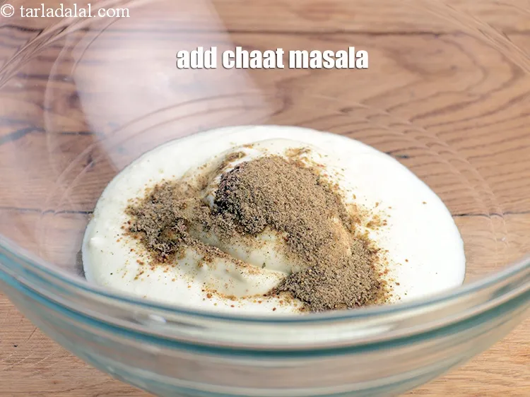 Step 21 – Add &frac12; tsp <a href="https://www.tarladalal.com/glossary-chaat-masala-300i">chaat masala</a>.