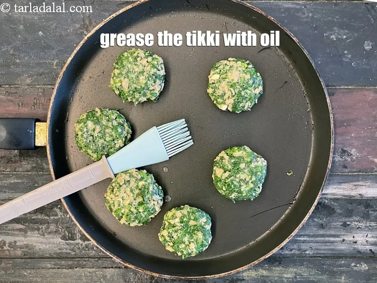 Step 34 – Then grease the top of the tikki with little oil.