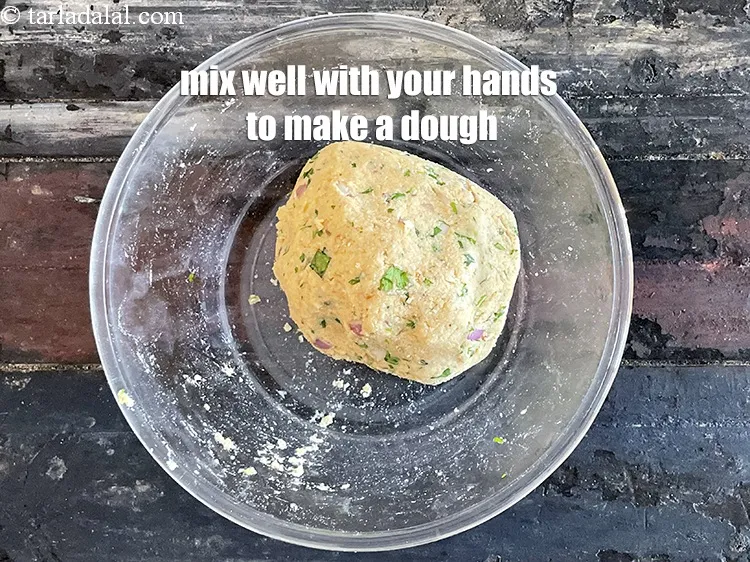 Step 25 – Mix well with your hands to make a dough.