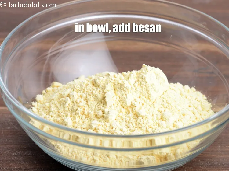 Step 20 – In a deep bowl, add 1&frac12; cups <a href="https://www.tarladalal.com/glossary-besan-chana-dal-flour-bengal-gram-flour-952i">besan (bengal gram flour)</a>.