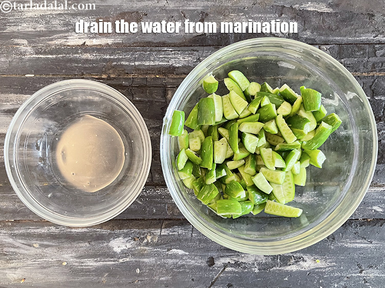 Step 11 – Drain the water from the tendli and discard.