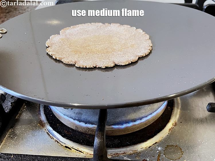 Step 29 – When using khakhra press cook on medium flame.&nbsp;Keep flipping the&nbsp;bhakri&nbsp;every 30 seconds to 1 minute …