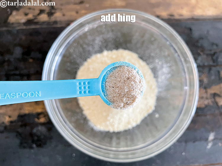 Step 35 – Add&nbsp;<meta charset="UTF-8" />a pinch of&nbsp;<a href="glossary-asafoetida-hing-113i">asafoetida (hing)</a>.