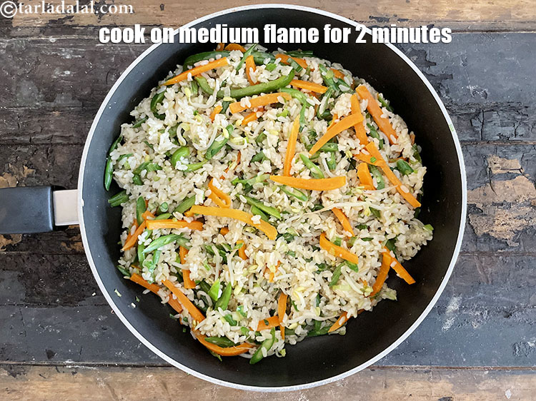 Step 26 – Cook on a medium flame for 1 to 2 minute.