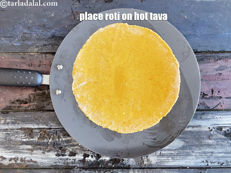 Step 24 – Place roti on hot greased tava.