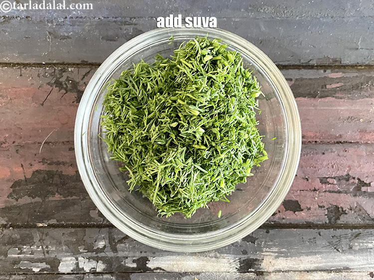 Step 30 – Add&nbsp;<meta charset="UTF-8" />1/4 cup&nbsp;<a href="glossary-chopped-dill-leaves-1849i">chopped dill leaves</a>&nbsp;(shepu / suva bhaji).