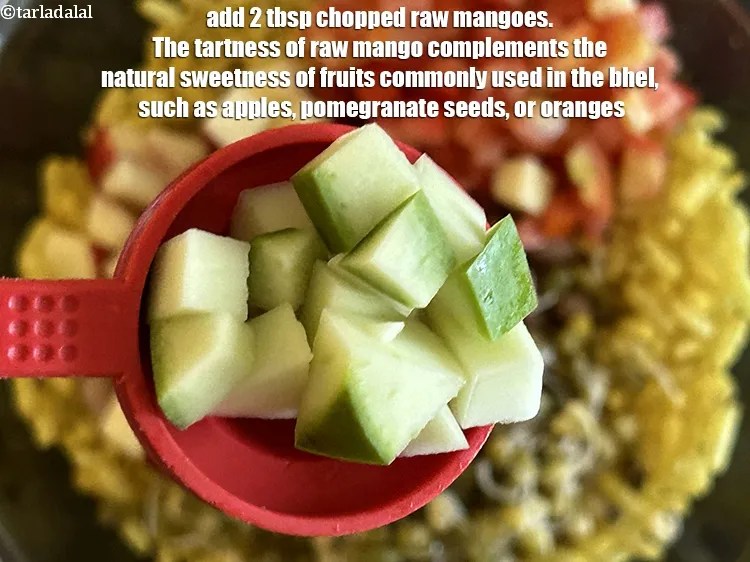 Step 21 – Add&nbsp;<meta charset="UTF-8" />2 tbsp&nbsp;<a href="glossary-chopped-raw-mangoes-2032i">chopped raw mangoes</a>.&nbsp;The tartness of raw mango complements the natural sweetness …