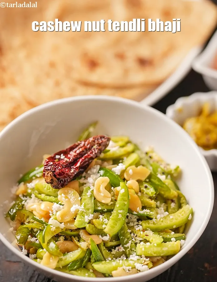 स्टेप 19 – <strong>टेंडली काजू की सब्जी</strong>&nbsp;गरमा गरम परोसें।