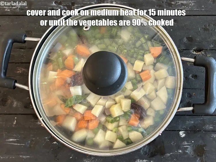 Step 23 – Cover and cook on medum heat&nbsp;&nbsp;for 15 minutes or until vegetables are 90% cooked.